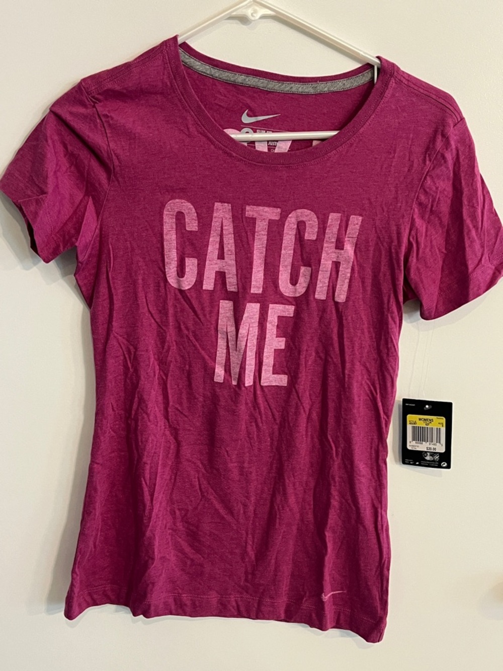 Women’s size Slim Fit Small NWT Nike Catch Me If You Can Shirt